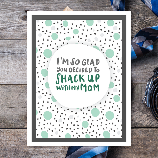 Greeting card with hand lettered text 'I'm so glad you decided to shack up with my mom' on a polka dot background.