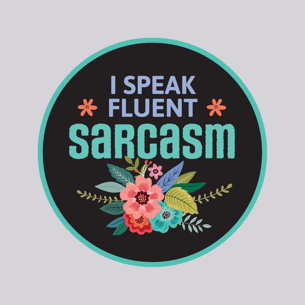 Circular sticker with 'I speak fluent sarcasm' text and floral design on a black background