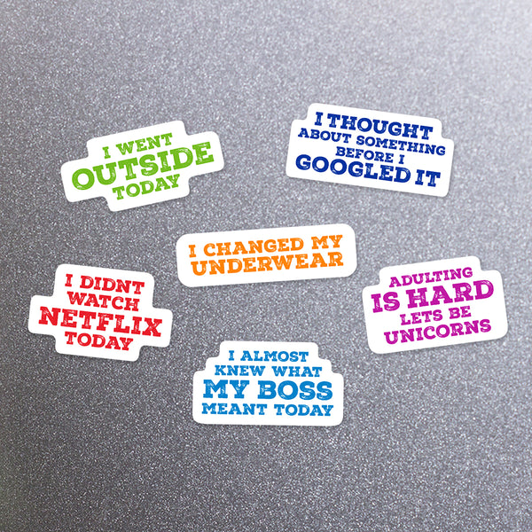 Set of humorous adulting expressions magnets with various sayings like 'I went outside today', 'I thought about something before I googles it', 'I changed my underwear', 'I didn't watch Netflix today', 'Adulting is hard. Let's be unicorns', 'I almost knew what my boss meant today'