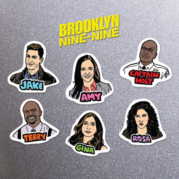 'Brooklyn Nine Nine' themed magnets including 'Jake' 'Amy' 'Captain Holt' 'Terry' 'Gina' 'Rosa' on a metal background