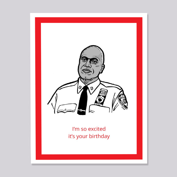 A birthday greeting card featuring a black and white illustration of Brooklyn Nine Nine's Captain Holt with ra ed border and the text 'I'm so excited it's your birthday' in red on a white card, shown against a light gray background.