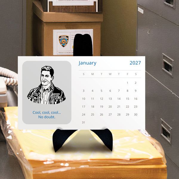 A brooklyn nine nine 2027 calendar shown against a police station background, featuring a black-and-white illustrated portrait of jake with text 'cool, cool, cool... no doubt.'