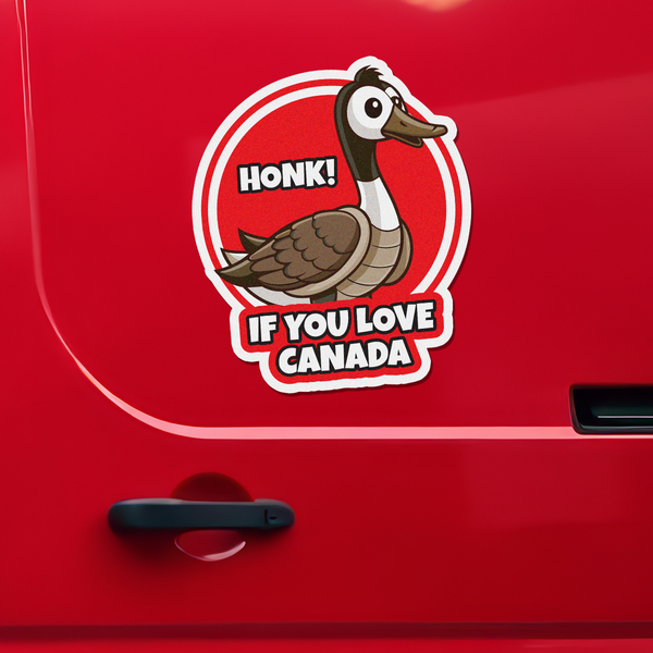 A die-cut vinyl sticker featuring an illustrated cartoon Canada goose with the text 'HONK! IF YOU LOVE CANADA' in bold white letters with black outlines, shown applied to the side of a red vehicle.