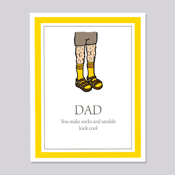 Greeting card with illustration of socks and sandals with text 'Dad you make socks and sandals look cool' on a gray background