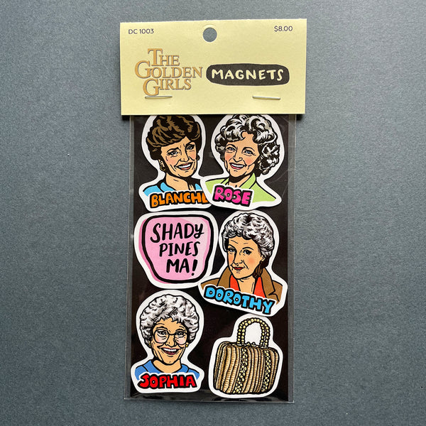 Packaged magnets featuring images of characters from 'The Golden Girls' on a gray background.