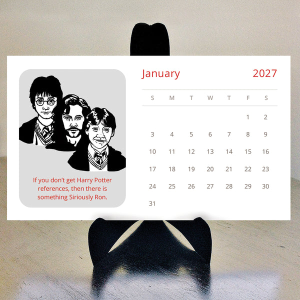 A Harry Potter-themed 2027 desk calendar , featuring black-and-white illustrations of Harry, Ron, and Sirius Black with a funny quote, shown against a neutral beige background with a black display stand.