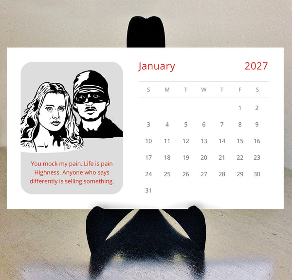 A Princess Bride 2027 calendar featuring a black-and-white illustrated portrait of a couple with red text, displayed on a black easel against a beige wall.