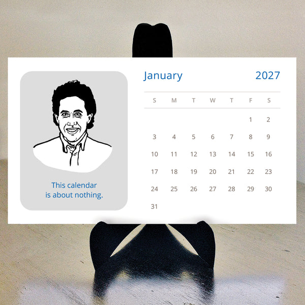 A 2027 desk calendar featuring a black-and-white illustrated portrait of Jerry Seinfeld on a black stand and text 'This calendar is about nothing.