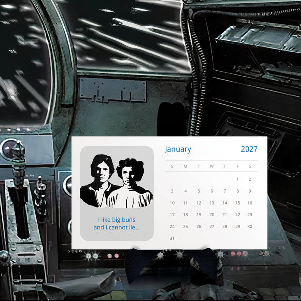 A 2027 Star Wars illustrated desk calendar on a black easel with a millenium falcon background. Illustration of han solo and princess leia with text 'I like big buns and I cannot lie'