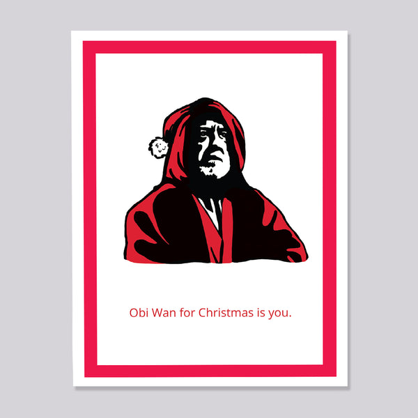 A greeting card featuring a stylized graphic portrait of Obi Wan wearing a red Santa hat and robe on a white background, framed by a bold red border. Below the portrait, the text reads 'Obi Wan for Christmas is you.'