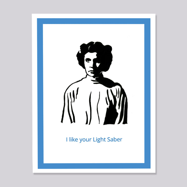 A greeting card featuring a black illustration of a Princess Leia with a light saber, bordered by a blue frame on a white background, with the text 'I like your Light Saber' printed in blue at the bottom.
