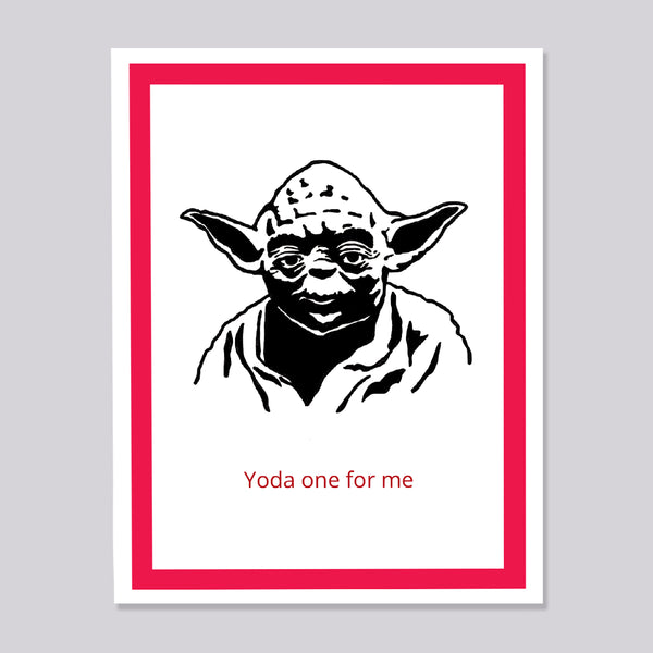 A greeting card featuring a black line art illustration of Yoda with the text 'Yoda one for me' in red below. The print has a white border, a thick magenta-pink inner border, and is displayed against a neutral light gray background.