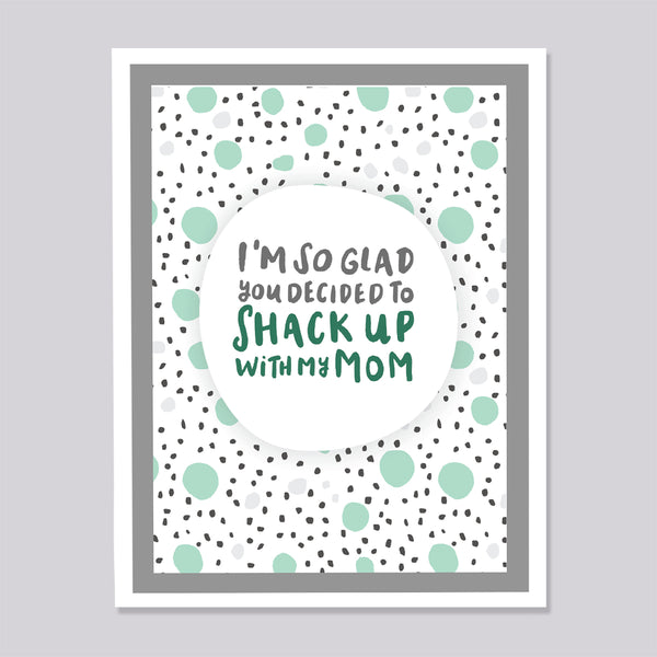 Greeting card with hand lettered text 'I'm so glad you decided to shack up with my mom' on a polka dot background.
