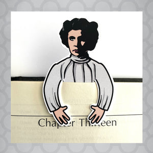 Illustration of Star Wars princess leia as a die cut bookmark sticking out of book. Caption says May the book be with you on front of book.