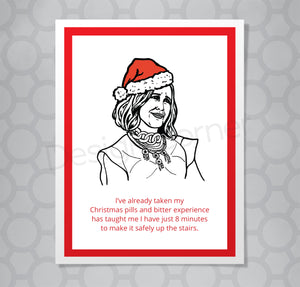 Illustration of Schitts Creek Moira rose on Christmas card with caption "I've already taken my Christmas pills and bitter experience has taught me I have just 8 minutes to make it safely up the stairs."