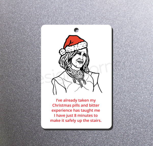 Illustration of Schitts Creek Moira on magnet ornament. Caption says ""I’ve already taken my Christmas pills and bitter experience has taught me I have just 8 minutes to make it safely up the stairs."