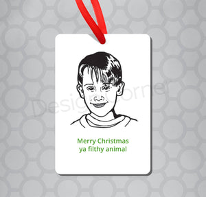 Illustration of Kevin from Home Alone on magnet ornament with caption "Merry Christmas ya filthy animal."