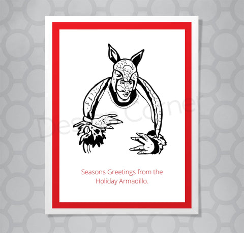 Illustration of Ross from Friends dressed as an armadillo on a greeting card with caption "Seasons Greetings from the Holiday Armadillo."