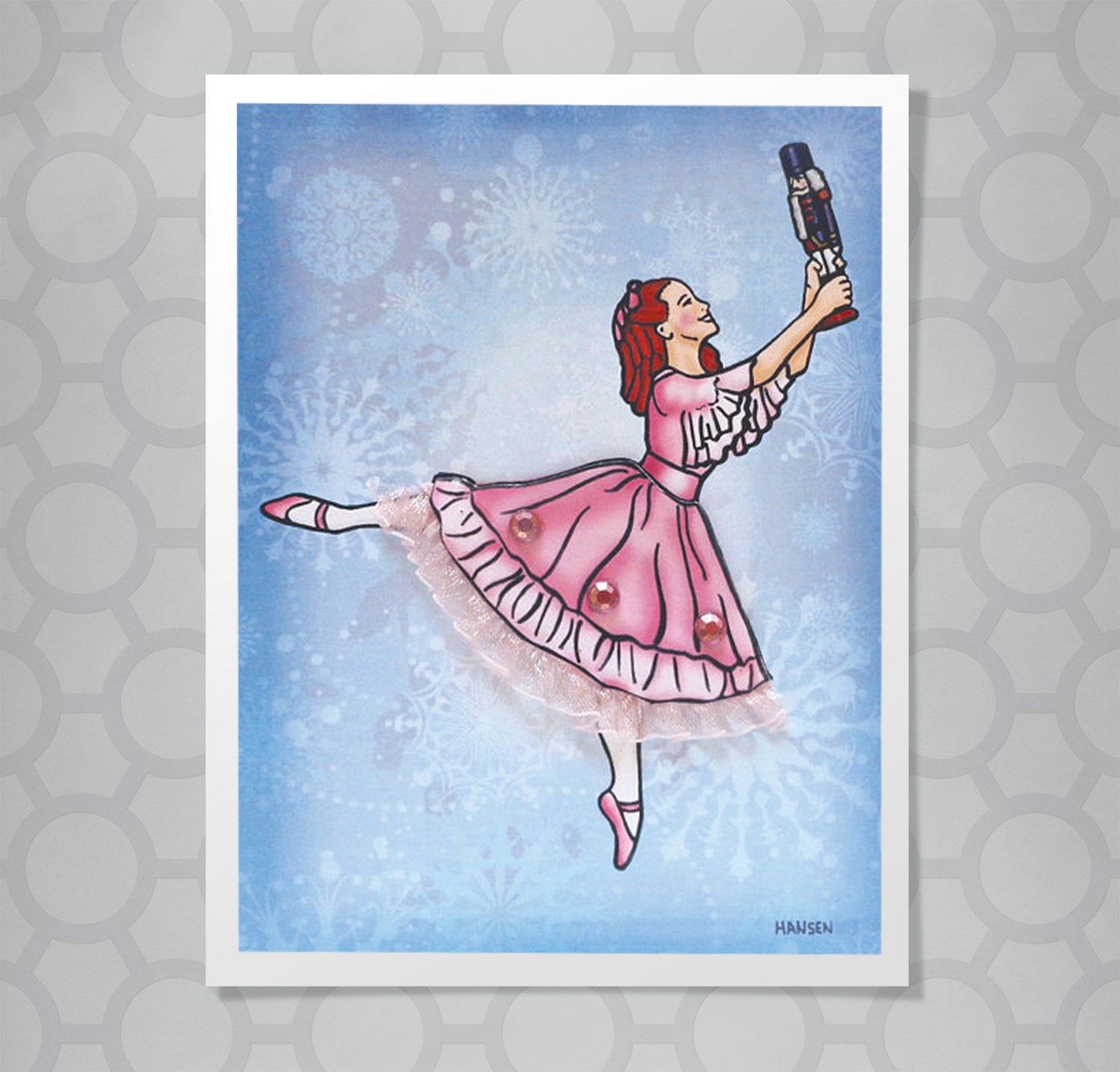 Illustration of the nutcracker ballerina Claire on point with a dimensional skirt.