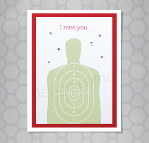 Image of target practice person with holes in card around it on greeting card with caption I miss you